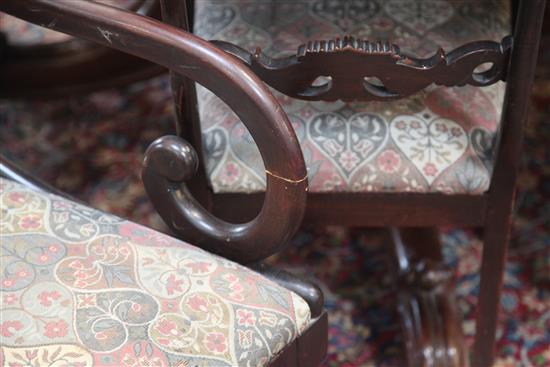 A harlequin set of twelve (6 + 6) William IV mahogany dining chairs,